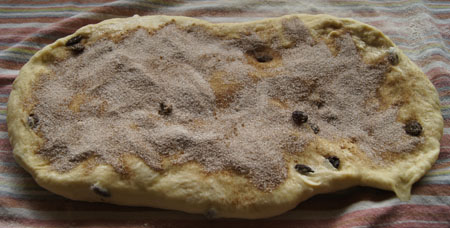 cinnamon sugar sprinkled on dough